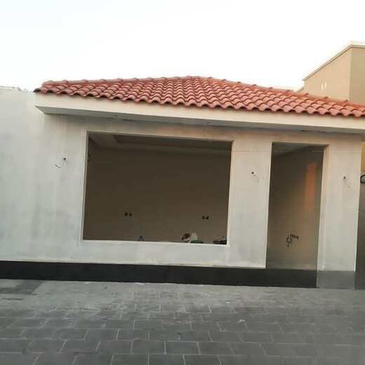 ترميم واجهة مبنى في حي النخيل - حي النخيل